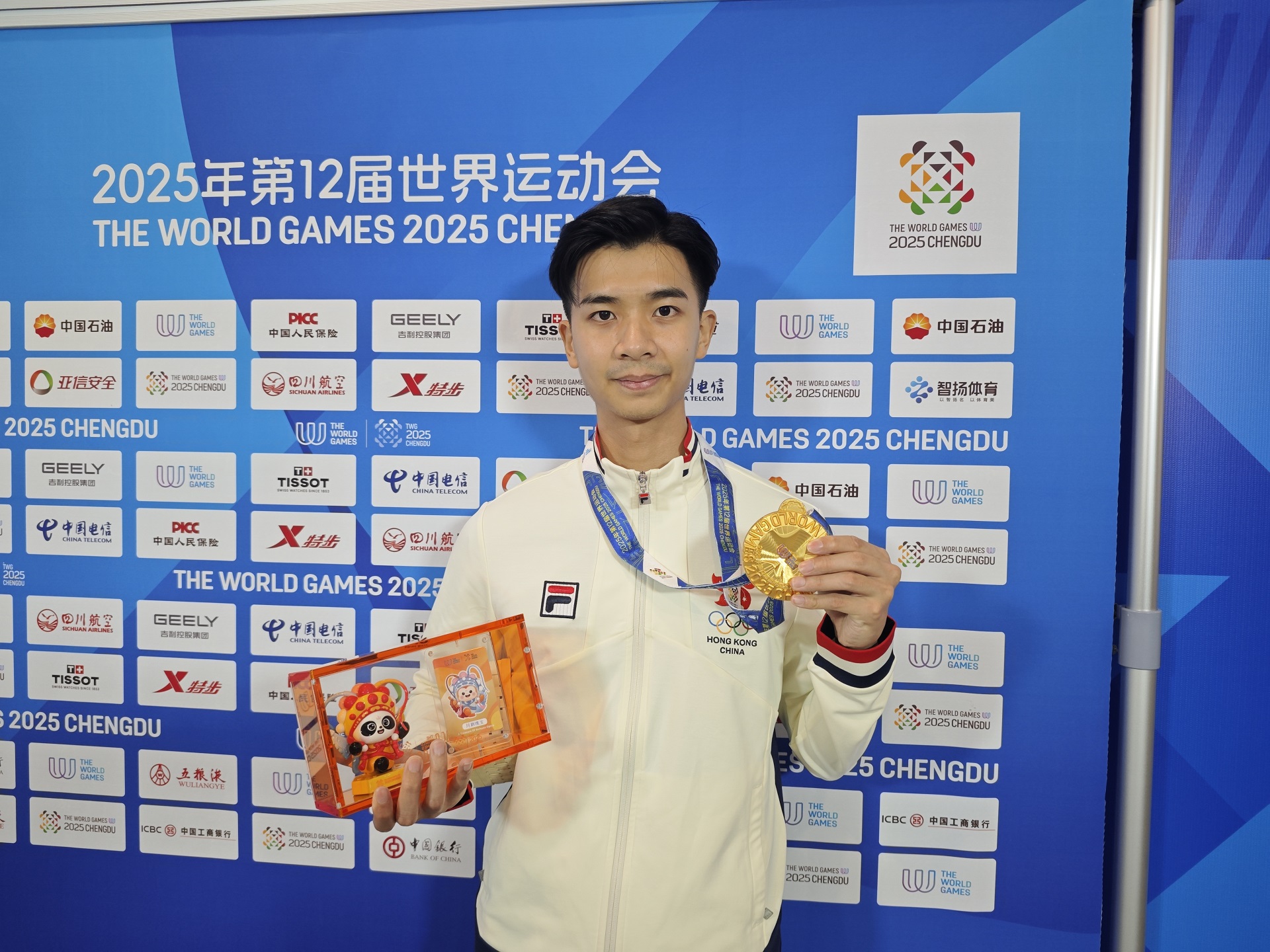 成都世運(yùn)會(huì)傳捷報(bào)：楊頌熹勇奪太極金牌 港隊(duì)?wèi)?zhàn)績(jī)?cè)偻黄? title=